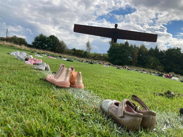 A Thousand Pairs of Children's Shoes Laid at the Angel of the North to Mourn Death of Child Climate Victims