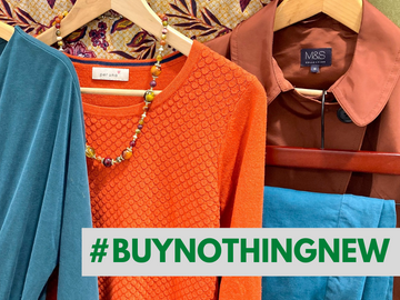 Buy nothing new. Autumnal clothes with message to buy more preloved fashion