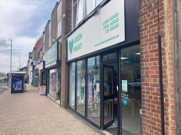 Green Heart shopfront on Gateshead High Street with view facing down the street towards Newcastle
